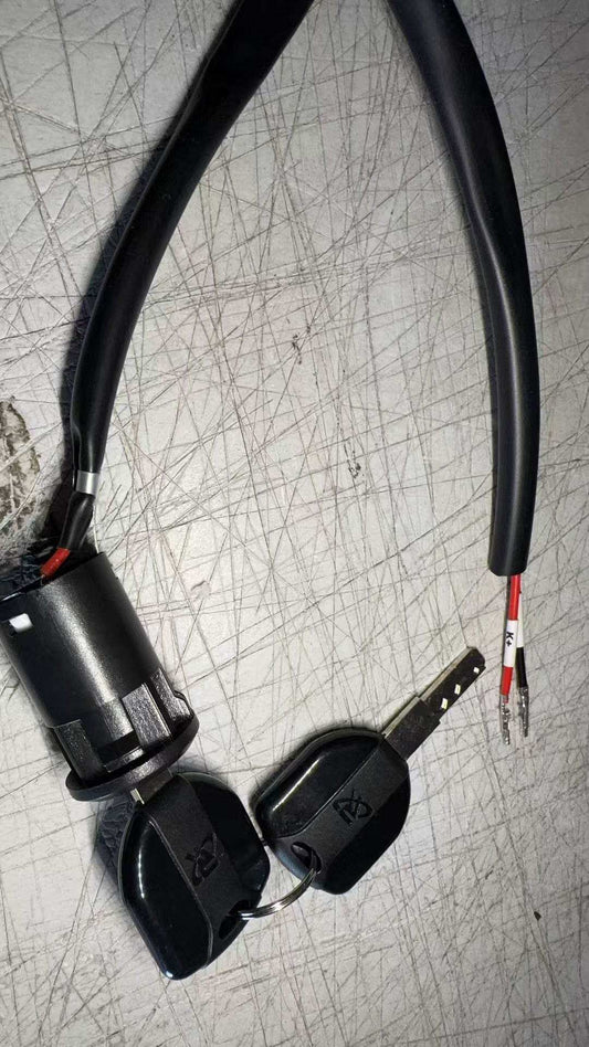 Lock and key set for floor scrubber machines with wiring connector