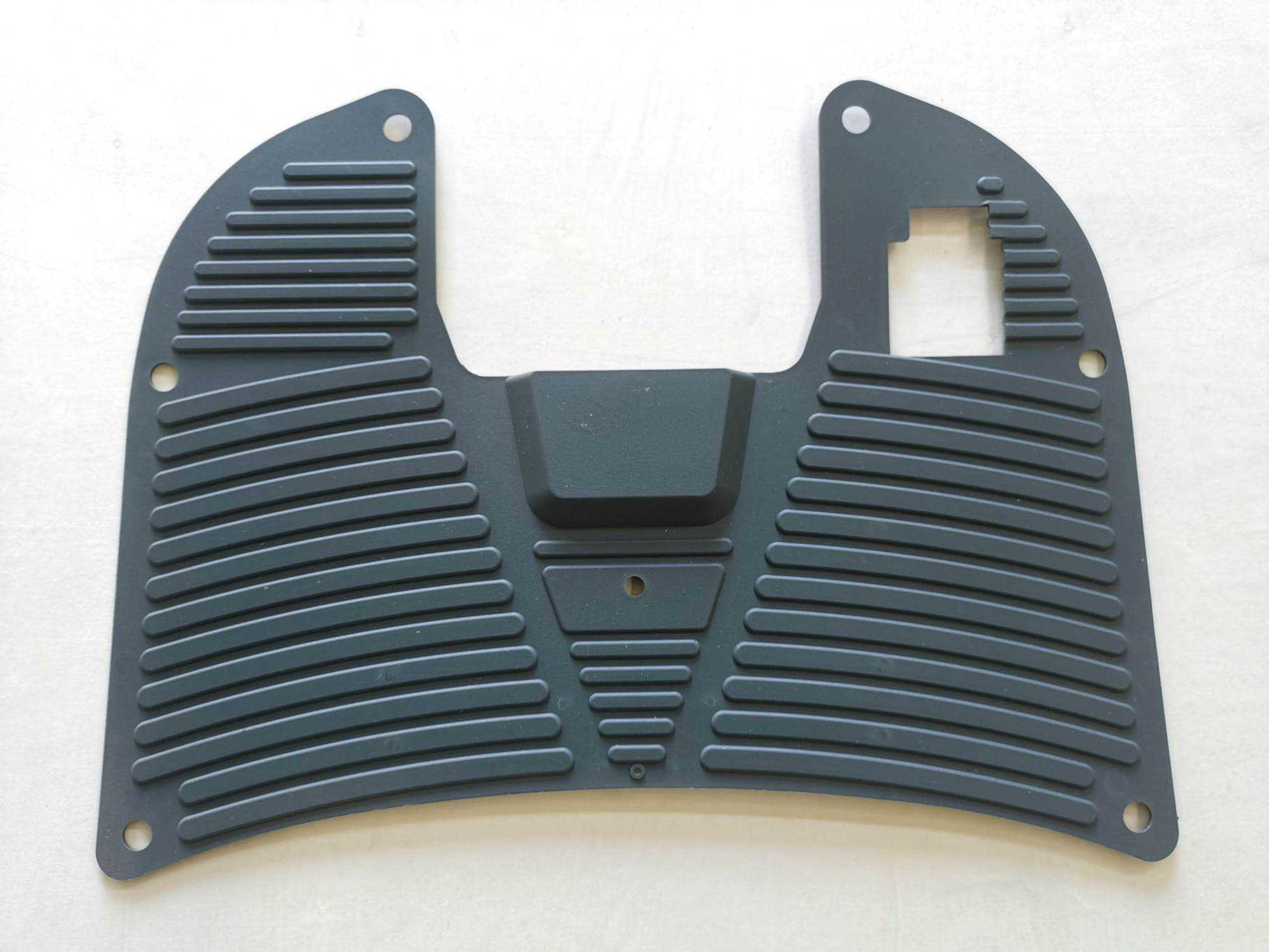 Plastic floor mat for 70 Series floor scrubber machines with textured surface and mounting holes