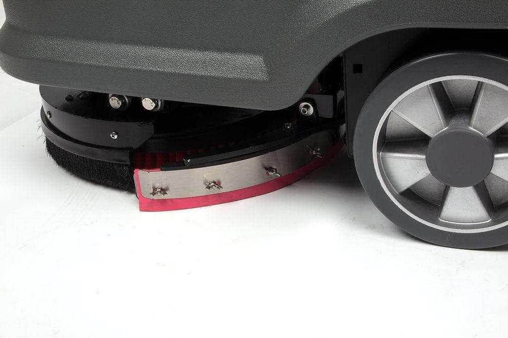 Close-up of RT15 14-inch battery powered commercial floor scrubber brush and wheel