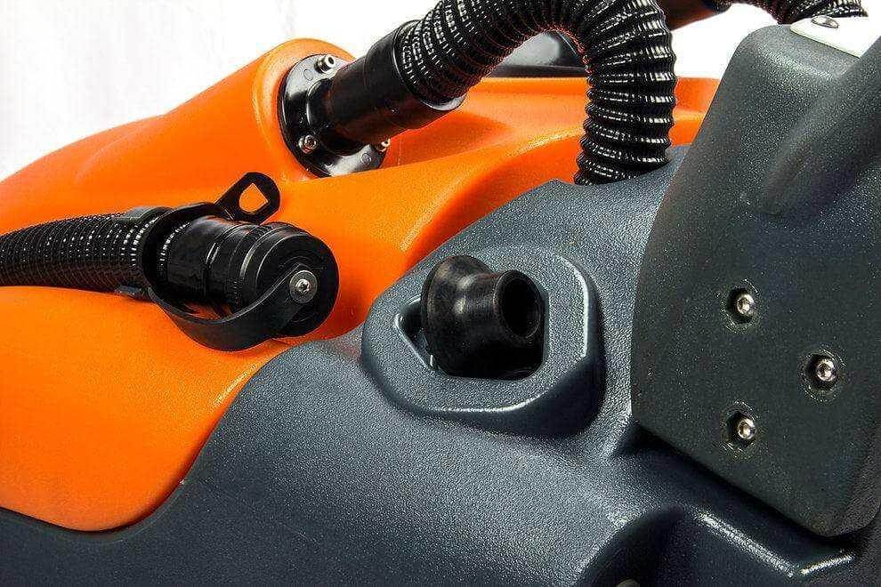 Close-up of RT50 battery powered walk-behind floor scrubber showing hose and tank details