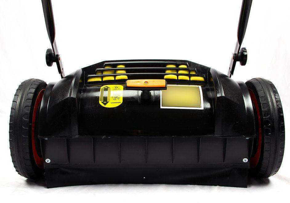 Manual Push Floor Sweeper RT980 with dual spinning brushes and 38-inch wide cleaning path for efficient sweeping.