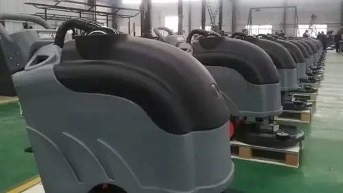 Floor scrubber being assembled