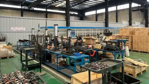 The technician is inspecting the parts